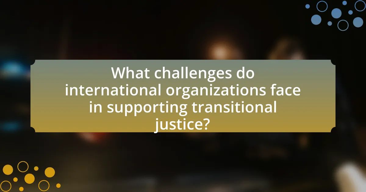 What challenges do international organizations face in supporting transitional justice?